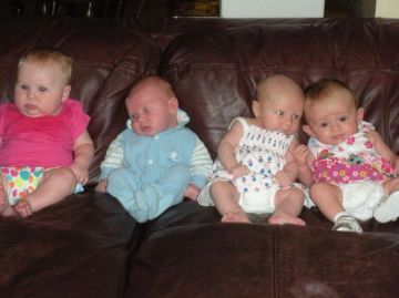 4 babies and a couch